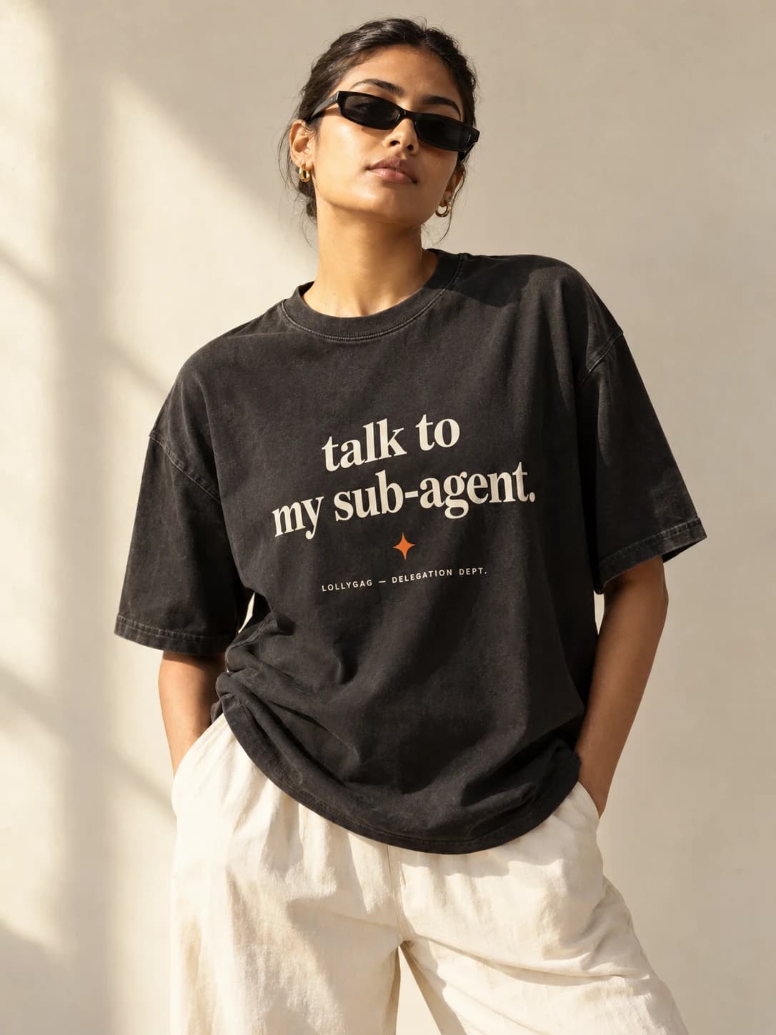 Talk to my sub-agent — model wearing Washed black tee, front